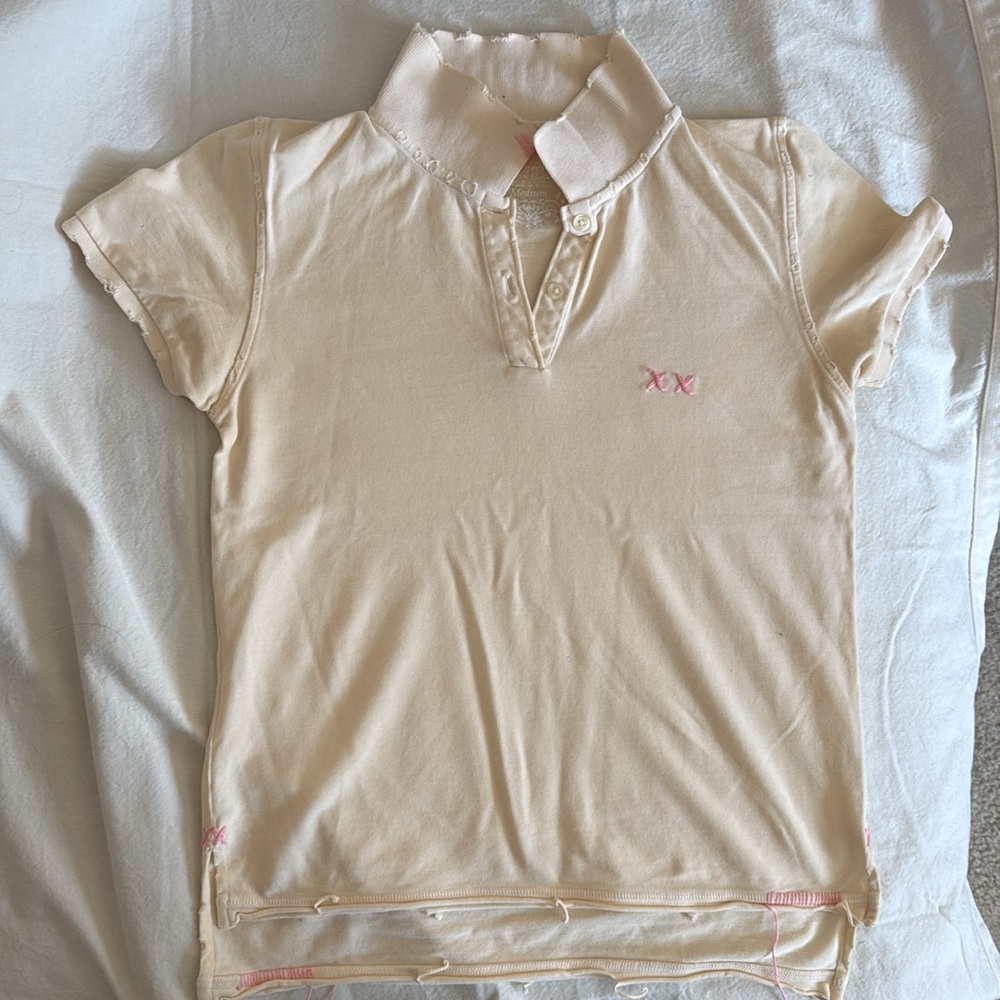 Vintage short sleeve polo with text on collar